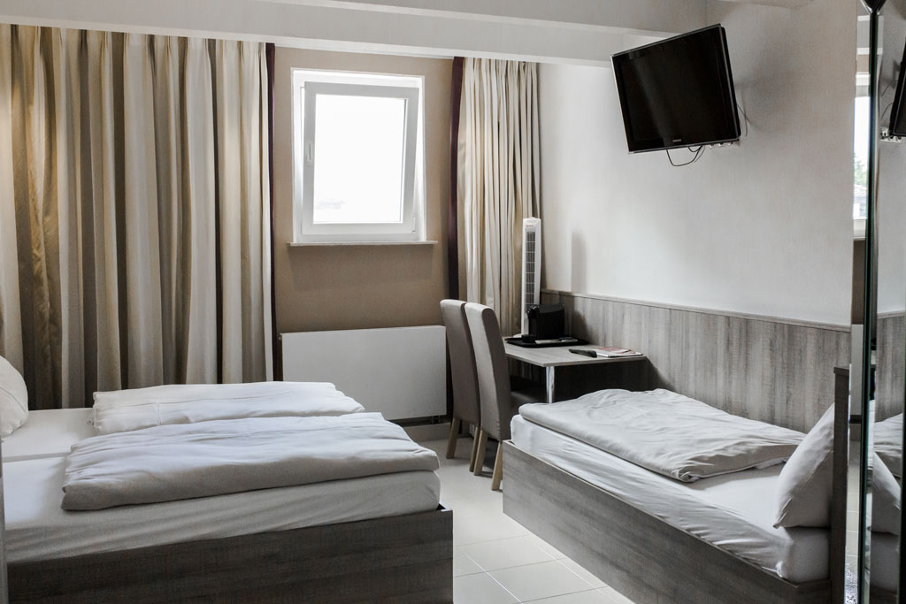 Dreibettzimmer